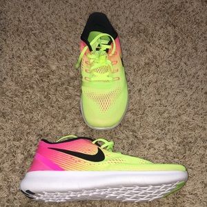 Pink and Neon Nike tennis shoes